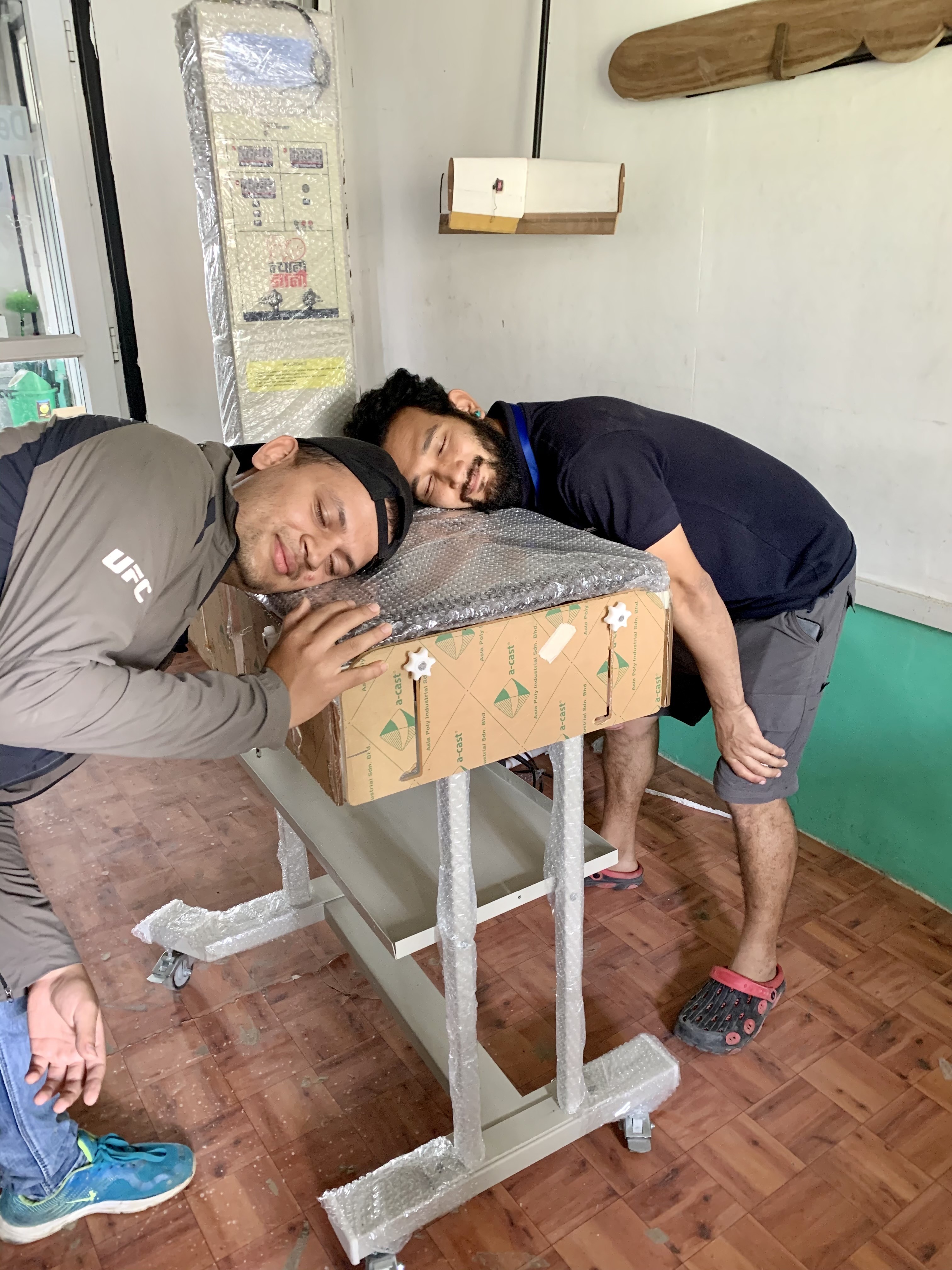 Me and Sanjay while packaging